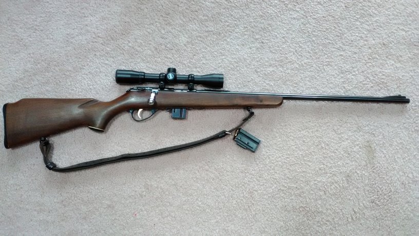 J.C. Higgins Model 42 DLM (a re-branded Marlin Model 980 DL), pictured with a spare magazine and Bushnell scope.