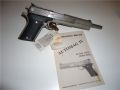AMT-AutoMag-IV-4-10mm-Magnum-45-Winchester-Magnum-Manual-FirearmWiki-Firearm-Wiki.jpg